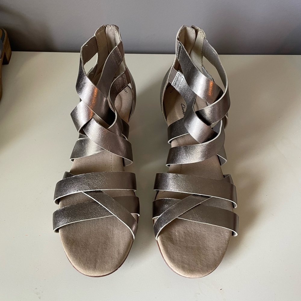 Leather Clark’s sandals.